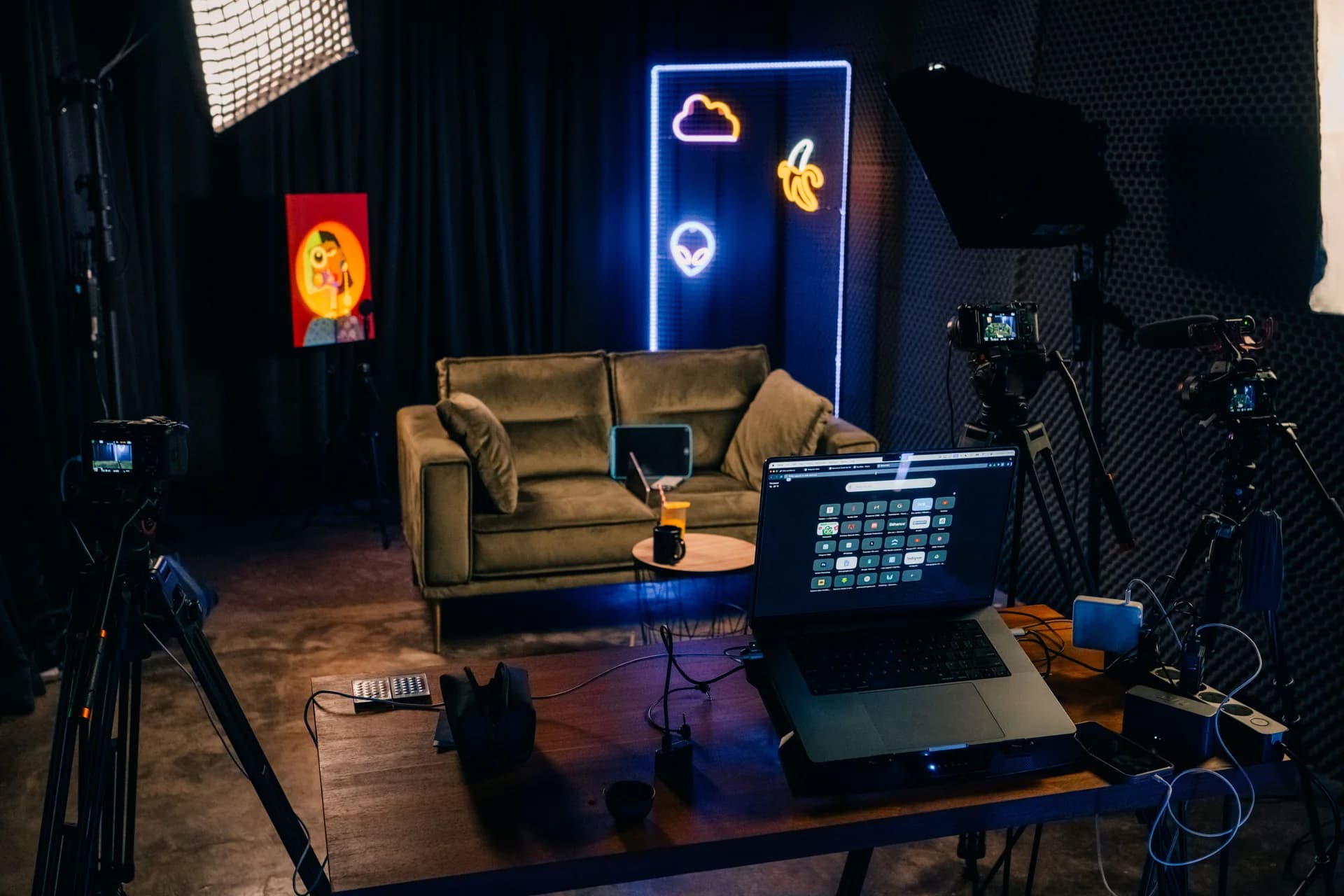 Cameras, softboxes, a mixing desk and a laptop ready for recording in Villo Studio